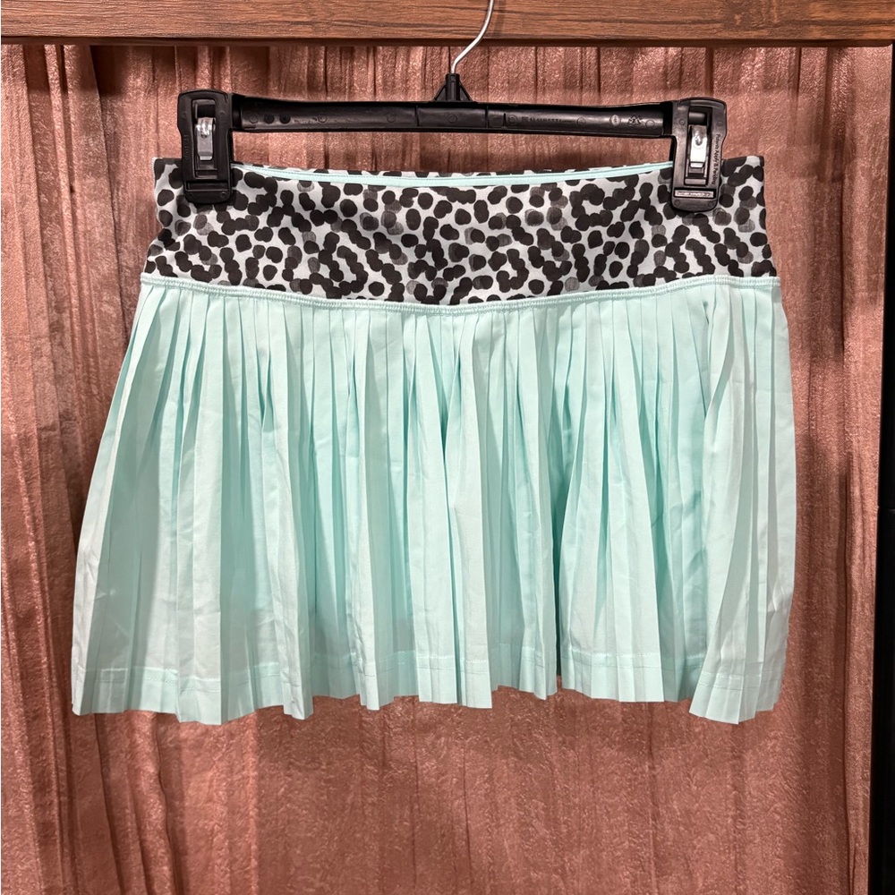 Lululemon Pleat to Street Skirt II in Tranquil Blue/Ace Spot Black.